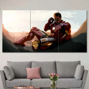 Tony Stark wall art featuring reflective moment in armor and scenic background 3 Panels Regular Layout